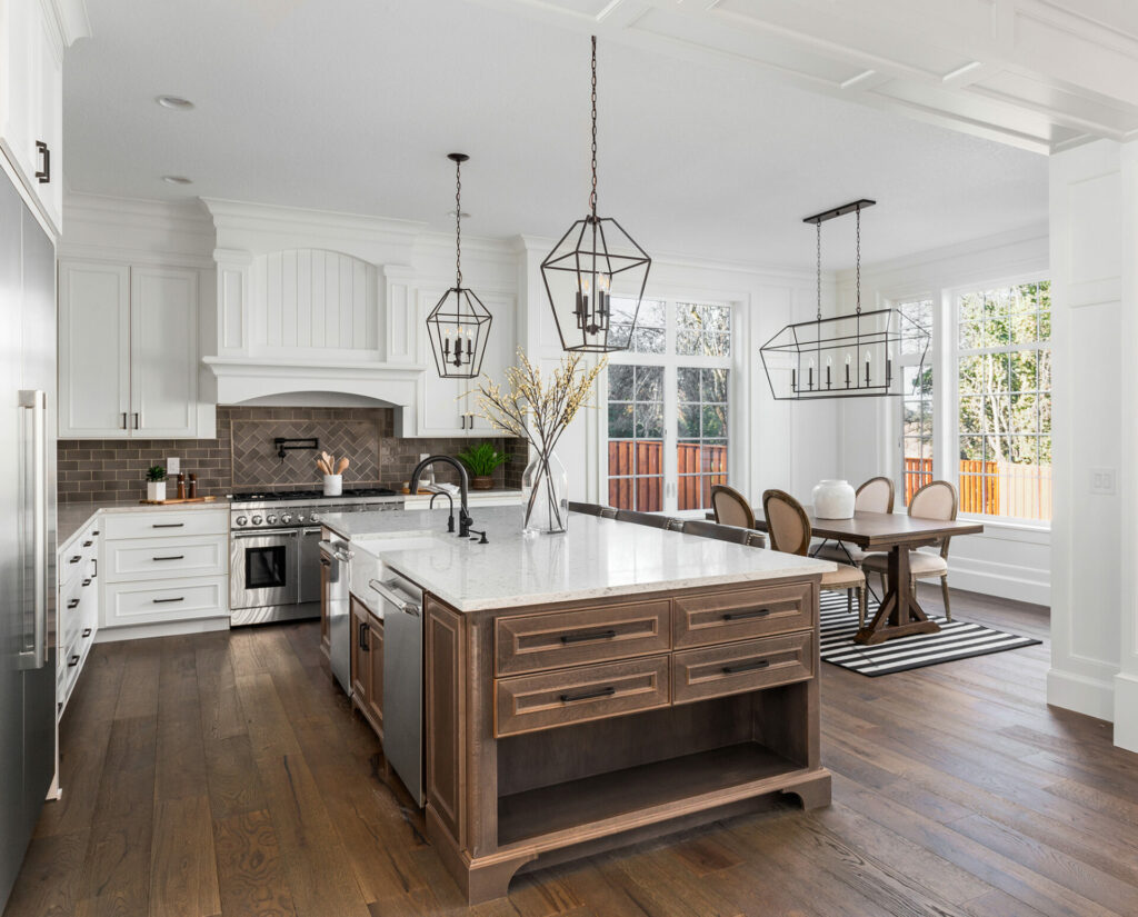 Hardwood Flooring in a large kitchen and dining area by A&S Carpet Collection in Allison Park, PA